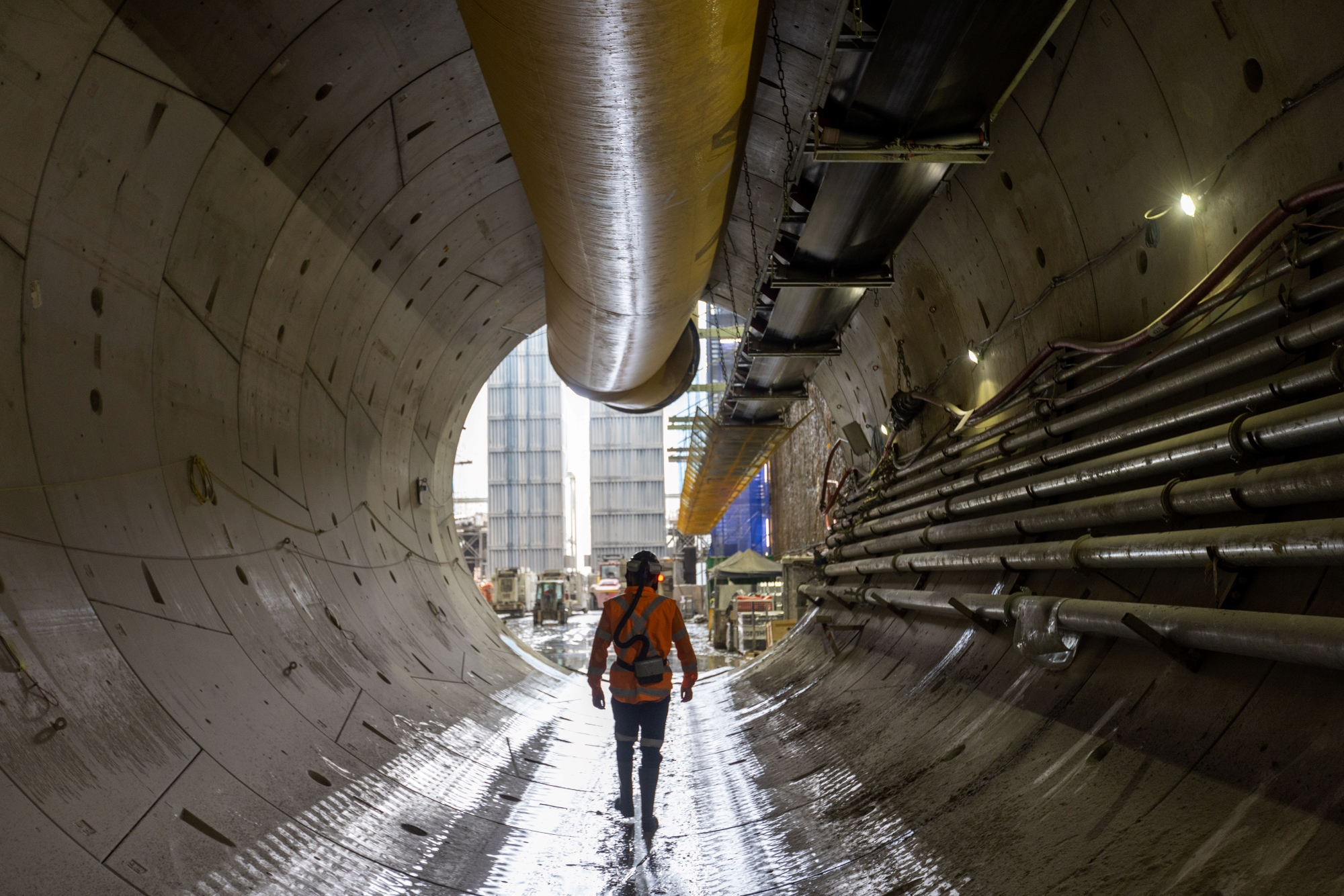 Construction worker walking through a Metro tunnel